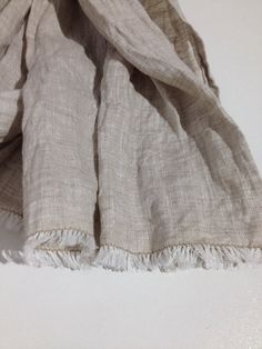 "Classy soft sand brown linen scarf / shawl for gentlemen or ladies. Wonderful linen texture, natural wrinkles. Made from high quality 100% European linen. We have pre-washed and softened the material so it is pleasant to wear right from the start. As it is with linen, it will become softer with every additional wash. Edges are frayed for more casual look and fixed to prevent further fraying. A great item in your wardrobe that will be joy to wear in summer as well as in winter. Dimensions: appro Beige Linen Bohemian Scarf, Bohemian Beige Linen Scarf, Shawl For Men, Linen Scarf, Linen Scarves, Linen Texture, Brown Colour, European Linens, Natural Linen