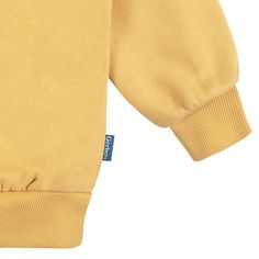 The ultimate choice for your little one's comfort and style, this set is the perfect pick for a fall or winter baby outfit. Crafted from a cozy fabric blend, this gender-neutral baby clothes set ensures your little one stays snug in cooler weather, and it's a breeze to add layers on chilly days. The easy-to-wear pullover top and comfort-stretch fit at the waist provide a secure and cozy feel, while allowing unrestricted movement for exploration. The solid yellow color suits any occasion, and the