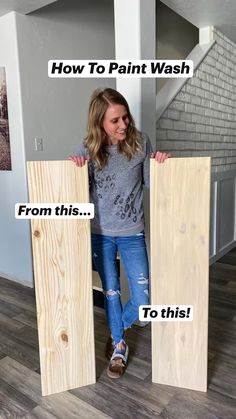 a woman standing next to two wooden boards with words on them that read how to paint wash from this to this