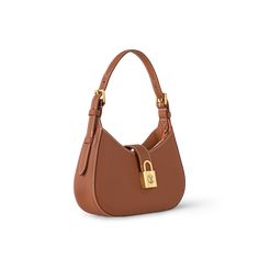 LOUIS VUITTON® - Low Key Shoulder Bag - Cognac Tan Designer Bag, Quite Luxury Bags, Timeless Cognac Bag With Branded Hardware, Quiet Luxury Accessories, Timeless Luxury Bags, High-end Brown Bag With Turn-lock Closure, Luxury Brown Shoulder Bag With Lock, Classic Brown Bag With Lock, Brown Bags With Lock For Everyday Luxury