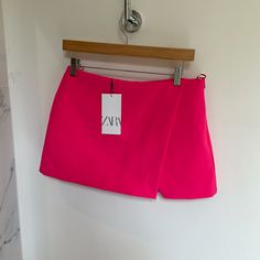 Zara Skirt With Shorts Underneath Nwt Spring Wrap Skirt For Night Out, Chic Pink Skort (shorts Skirt), Chic Pink Skort (skirt Shorts), Summer Workwear Short Skirt, Short Summer Skirt For Workwear, Short Summer Workwear Skirt, Summer Pink Asymmetrical Mini Skirt, Zara Skirted Bottoms For Summer, Zara Mini Skort For Party