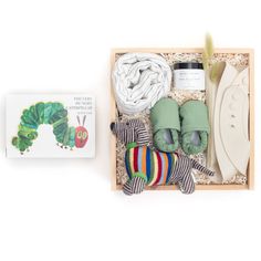 the very hungry caterpillar gift set includes its own stuffed animal, socks and cloths