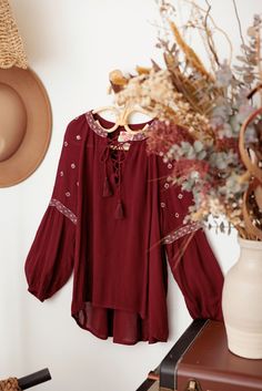 ♡ Look effortlessly stylish in our Ethnic Boho Embroidered Front Tie Girls Top. With its unique embroidered detailing and trendy front tie, this top will elevate your outfit to the next level. Designed for comfort with long sleeves, it's perfect for any occasion. Embrace your boho side and stand out from the crowd! ♡ Item Feature: ethnic boho, embroidered, front tie, long sleeve, light weight, beaded, festival, chic, stylish. Bohemian Cotton Blouse With Back Tassel Tie-up, Festive Bohemian Floral Embroidered Top, Bohemian Tops With Embroidered Hem For Spring, Bohemian Embroidered Hem Tops For Spring, Festive Tunic Top With Embroidered Neckline, Bohemian Long Sleeve Tops With Geometric Embroidery, Fall Cotton Top With Intricate Embroidery, Fall Cotton Embroidered Top With Intricate Embroidery, Fall Embroidered Cotton Top