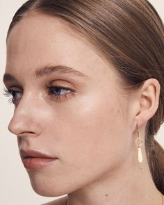 The Vega Earrings, in 18k Cross Brushed Gold Vermeil, are emblematic of our love of Ancient Greek jewellery. The decorative symbols are inspired by the jewellery that the Goddesses of Greek mythology would adorn themselves with.  
 The delicate panels are lined with a row of Black Sapphires which have been associated throughout the ages with protection, clarity and self-mastery. Egyptian Inspired Jewelry, Marquise Sapphire, Ancient Greek Jewelry, Soft Power, Gold Vermeil Jewelry, Greek Jewelry, Black Sapphire, Vermeil Jewelry, Natural Blue Sapphire