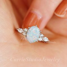 Vintage sterling silver white Opal ring, beautiful promise ring, unique birthday or anniversary gift. Materail: 925 Sterling Silver Main Stone: 6*8 mm Lab Opal Cut: Oval Side stone: CZ CS0456 ✈Free Shipping; 🎁Packaed with beautiful ring box; ★ 30 days return plicy; 🌺Custom service: 👉Stones can be different color, please contact for a custom request; 👉Can also customize with solid gold; 👉Engraving available; Home page:  https://www.etsy.com/shop/CarrieStudio White Opal Sterling Silver Wedding Ring, White Opal Sterling Silver Ring For Wedding, White Sterling Silver Birthstone Ring For Anniversary, White Opal Dainty Birthstone Ring, White Dainty Opal Birthstone Ring, Sterling Silver Diamond White Opal Promise Ring, Sterling Silver Opal Promise Ring In Diamond White, White Opal Ring As A Gift, White Opal Ring For A Gift