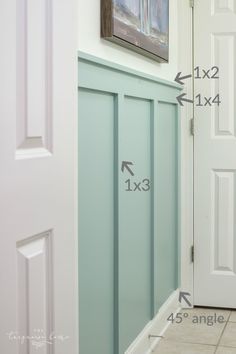 measurements for the front door and entryway to an apartment building with white painted walls