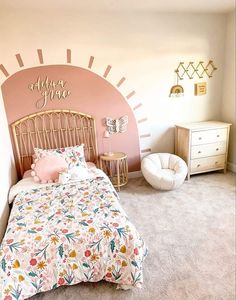 a bedroom decorated in pink and gold with an arched headboard that says, always grace