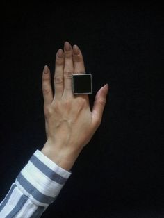 Statement rings for women Black square Iridescent white ring large hipster gothic big geometric quadrate minimal silwer jewelry gift for sister for artist for designer NY Christmas gift If you are purchasing clear/black ring remember that ornament on glass will be diferent. ITEM DETAILS This ring is made to draw the attention of others and emphasize your unique style. With it, each woman feels more confident and stronger. It can be a nice gift for any girl and women for any holiday. It has unusu Handmade Minimalist Rectangular Rings, Handmade Rectangular Minimalist Rings, Handmade Square Minimalist Jewelry, Minimalist Silver Square Ring, Minimalist Black Square Jewelry, Modern Handmade Jewelry, Ny Christmas, Hipster Jewelry, Ring Geometric