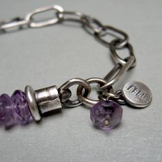 "Chain bracelet in oxidized silver and amethyst, it is composed of a part made of silver with long and flat hammered links; and a string of amethyst. The rings, end cylinders, spacers, and pendants are all sterling silver and handcrafted. Weight: 0,60 oz Length 7,48\" It is a light, original bracelet, beautiful to always wear, alone or combined with other bracelets. Jewel made original by craftsmanship, which adds value and characteristics to each of my pieces. Thank you for visiting, if you wan Dangle Bracelet, Silver Chain Bracelet, Silver Wedding Rings, Amethyst Bracelet, Oxidized Sterling Silver, Tiffany Heart, Heart Charm Bracelet, Silver Studs, Silver Earrings Studs