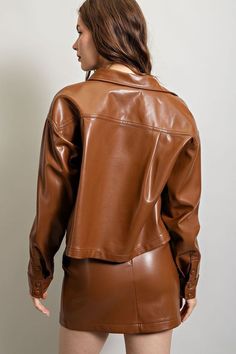 Pleather long sleeve jacket featuring a cropped length, a button down front, one chest pocket, buttoned cuffs and a collared neckline. Model is 5'8" and is wearing a small. Cropped Leather Jacket, Long Sleeve Jacket, Leather Jacket Black, Sleeve Jacket, A Button, Long Sleeves Jacket, Black Crop, Cappuccino, Chest Pocket