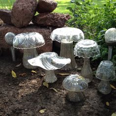 there are many glass mushrooms on the ground