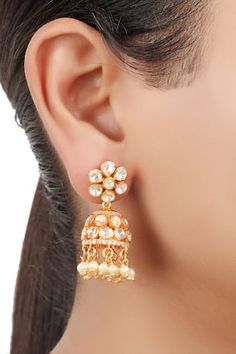 925 silver, gold finish jhumkas handcrafted in floral geometric cut work details, yellow moissanite polki, stones embellishment and synthetic pearl drop tassels.
Type: Moissanite Polki, Synthetic Pearls and Stones Embellished
Composition: 925 Silver
Color: Yellow
Other Details: 
Handcrafted
Floral geometric pattern
Dimensions (in inch): 1.85 x 0.59
Weight (in gms): 18
Closure: Push back - Aza Fashions Festive Gold Designer Danglers, Designer Chandbalis For Diwali, Designer Wear Festival Chandbalis, Festive Jhumkas With Gota Work, Festive Designer Jhumkas With Gota Work, Festive Gota Work Jhumkas, Festive Designer Wear Jhumkas With Gota Work, Fusion Style Festive Jhumkas With Gota Work, Designer Jhumkas With Latkans For Diwali