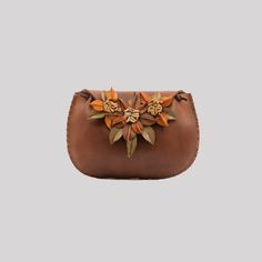 Our handcrafted leather purse bag model with a stylish and eye-catching design suitable for multi-purpose use. We prepare our collections by combining high quality natural leathers with Turkish handcraftsmanship. 100% genuine cow leather 100% Turkish handcraft Since the product is handmade, there may be slight differences from the image. Artisan Brown Shoulder Bag For Gift, Leather Pouch Clutch With Leather Handles, Hand Tooled Satchel Bag As Gift, Hand Tooled Satchel Bag For Gifts, Handmade Artisan Saddle Bag For Everyday Use, Artisan Handmade Saddle Bag For Everyday Use, Hand Tooled Crossbody Bag For Daily Use, Hand Tooled Shoulder Bag As Gift, Hand Tooled Shoulder Bag For Gift