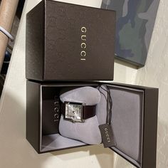 Brand New With Tags And Original Box. Never Worn Once. **Does Need A New Battery. Gucci Timeless Leather Watch, Timeless Gucci Leather Watch, Gucci Watches With Subdials For Gift, Designer Brown Watches With Diamond Hour Markers, Designer Watches With Subdials As Gifts, Designer Rectangular Watches With Palladium Hardware, Gucci Analog Watch Gift, Gucci Analog Watch As Gift, Gucci Analog Watches For Gift