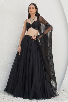 Black can can attached flared lehenga featuring crystal and sequin embellished waistband. Comes with embellished strappy padded blouse and dupatta. - Aza Fashions Elegant Black Organza Choli, Black Embellished Organza Choli, Embellished Black Organza Choli, Black Fitted Organza Sharara, Fitted Black Organza Sharara, Black Fitted Organza Choli, Fitted Black Organza Choli, Black Organza Choli For Wedding, Black Fitted Organza Lehenga