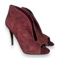 These Elegant Burgundy Wine Suede Peep-Toe Booties Are The Perfect Blend Of Sophistication And Edge. They Feature A Stunning V Cut Open-Front Design, Metallic High Heels, And A Chic Silhouette. New, Never Worn, However Please Note That There Are Some Imperfections Including Cracks In The Inner Lining And Scratches On The Heels. Despite These Imperfections, They Remain A Bold And Stylish Choice For Any Occasion. Burgundy Ankle-high Heels For Fall, Burgundy High Heel Fall Heels, Burgundy High Heel For Fall, Formal Open Toe Suede Boots, Formal Suede Open Toe Boots, Burgundy High Heels For Fall, Fall Formal Open Toe Booties, Burgundy Evening Heels For Fall, Burgundy Suede Pointed Toe Heels