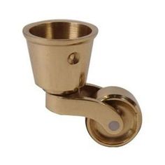 an antique brass cup holder on a white background