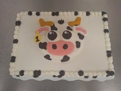 a cake with a cow face on it