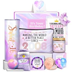 a birthday gift box with pink and purple items