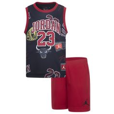 Gear up your little boys for playdates, sensory classes, and everything beyond with the Jordan 23 Printed Jersey Set. A cute tribute to greatness, this two-piece set completes your little ones’ look with a sleeveless top and matching shorts. The top boasts a crew neck for a snug feel and a Jordan logo on the chest to add an iconic hoop flair to your kiddos’ look. The shorts feature an elastic waistband and a Jumpman logo on the leg to help your little powerhouses make adorably dynamic moves in c Sporty Cotton School Sets, Playful Sports Cotton Sets, Red Casual Playtime Sets, Black Graphic Print Sets For Playwear, Red Cotton Sports Set, Red Sporty Playtime Sets, Sporty Red Playwear Set, Red Sporty Playwear Sets, Black Graphic Print Playwear Sets