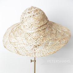 Made from natural undyed open weave strip straw and twisted jute braid, this capeline has a nice big brim so you can make the summer hat of all summer hats! They all have their own personality, some are more closely woven, some have more colour variation. A true sign that each one is unique and ultimately handmade. Capeline measures: Flat measurement from crown tip to brim: 30.4cm (12 inches) Brim width from side crown to brim edge: 11cm (4.3 inches) *Please note that this is not a finished hat Spring Straw Hat With Open Weave And Flat Brim, Artisan Woven Straw Hat For Summer, Artisan Woven Straw Hat For Spring, Spring Brimmed Straw Hat With Open Weave, Spring Straw Hat With Open Weave, Spring Open Weave Brimmed Straw Hat, Handwoven Natural Hat For Kentucky Derby, Spring Curved Brim Straw Hat With Open Weave, Natural Handwoven Hat For Kentucky Derby