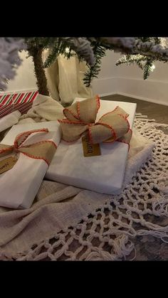 presents wrapped in burlap and tied with twine