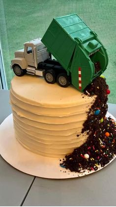 a large cake with a dump truck on top