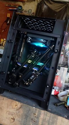 a computer case sitting on top of a wooden table