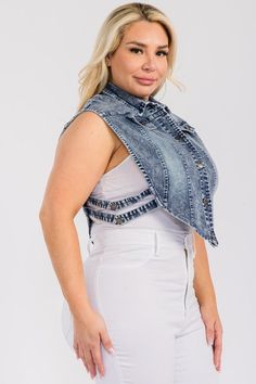 This plus size denim crop vest top is perfect for adding a stylish touch to any outfit. With a collared neckline and button-down design, it's both trendy and versatile. The cropped length adds a fun and flirty element while the denim material provides comfort and durability. A must-have for any wardrobe. Cropped Medium Wash Vest For Spring, Trendy Cropped Vest In Medium Wash, Trendy Medium Wash Cropped Vest, Cropped Buttoned Denim Vest For Spring, Cropped Denim Vest With Buttons For Spring, Trendy Spring Denim Vest With Button Closure, Trendy Sleeveless Denim Jacket With Button Closure, Trendy Spring Denim Vest With Buttons, Trendy Cropped Medium Wash Vest