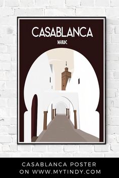 a white brick wall with a black and white poster on it that says cascablanca