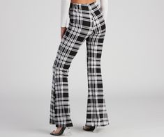 Add these flare pants to your growing plaid collection! They're designed with a high-rise elasticized waist on a soft. brushed knit fabric with a moderate stretch. Complete the look with pointed-toe booties.Fit & Features High-rise elasticized waist Plaid print Flared hem Soft brushed knit fabric. moderate stretch Runs true to size Plaid Flare Pants, Leopard Print Jumpsuit, Chiffon Romper, Dresses Flowy, Zebra Dress, Frayed Denim, Denim Romper, Sleeveless Rompers, Knit Pants