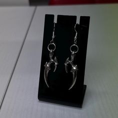 Silver claw earrings on fish hook ear wires  Comes with silicone backs matching necklace available ️ Arrives in pretty packaging ✨ Silver Fantasy Earrings For Halloween, Silver Gothic Metal Earrings, Halloween Accessories Jewelry, Dragon Claw Earrings, Halloween Silver Earrings, Spooky Silver Dangle Earrings, Claw Earrings, Earrings Halloween, Jewellery Gifts