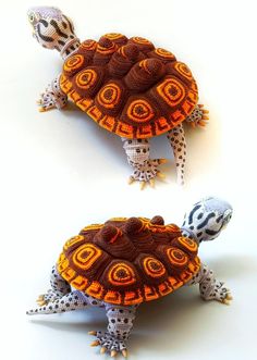 two knitted tortoises sitting next to each other