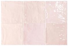 four different shades of pink and white tile on a white background, each with one square in the middle