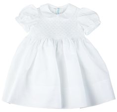 This crisp white girls dress is a true Feltman Brothers classic! The top of this beauty features smocking covered in lovely diamond embroidery until the waist, and scallop edges along the collar and cuffs. Ties in the back with a big bow for that perfect finishing look. The Feltman Brothers Diamond Smocked Dress - for Easter, Sunday wear, and your little one's special occasion! White Smock Dress, Feltman Brothers, White Smocked Dress, Girls Smocked Dresses, Special Occasion Gowns, Girls Smock, Girls White Dress, Standard Dress, Wedding Dresses For Girls