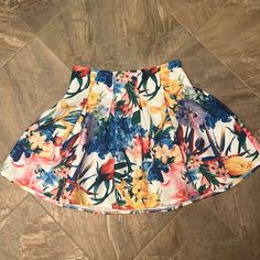 New Floral Skirt! Perfect Condition And Super Cute For A Casual Look Or Dressed Up For A Night Out! Size Small. Floral Print Skort For Vacation, Summer Floral Print Skort, Floral Print Skort For Spring Vacation, Spring Vacation Floral Print Skort, Summer Multicolor Floral Print Skort, Stretch Floral Print Skirt For Day Out, Multicolor Floral Print Bottoms For Brunch, Day Out Floral Print Skort, Floral Print Skort For Day Out