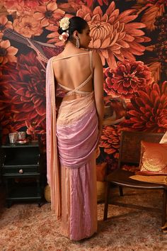 This pre-draped Lavender Peach Saree in contrasting lavender and peach hue makes it look absolutely gorgeous. The saree's fabric is lustrous and embellished with bead embroidery, giving it that glamorous appeal. As you approach a celebration in this surreal ensemble, you will be the town's topic. Crossband back blouse with center back hook opening Drops at the hem of the blouse Blouse and Saree ornamented with hand-tucked crystals and nalki all over Side zip closure in saree. From Moledro’s Riwa Lavender And Peach, Peach Saree, Butterfly Net, Open Image, 12 Weeks, Professional Cleaning, Bead Embroidery, Rumi, Beaded Embroidery