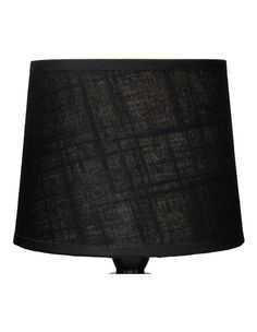 a black lamp shade on a white background