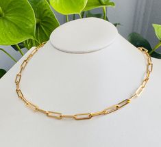 Indulge yourself in this fine 18k gold plated paperclip link chain necklace, a must-have for any jewelry collection. This necklace  exudes opulence and complements the intricate design of its chain perfectly. This minimalist piece is a true reflection of your unique style and personality. Treat yourself or surprise a loved one with a gift that will be treasured for years to come. - Necklace: Length is 40cm ext 5cm, Width is 4.5mm - 18k gold filled stainless steel  - Perfect Dainty necklace for y Minimalist Paperclip Chain Necklace As Gift, Minimalist Paperclip Chain Necklace For Gift, Minimalist Paperclip Chain Necklace Gift, Minimalist Necklace With Rectangular Links Gift, Minimalist Rectangular Link Necklace As Gift, Minimalist Paperclip Necklace As Gift, Minimalist Paperclip Necklace For Gift, Gold Chain Paperclip Necklace For Gifts, Gift Clavicle Chain Necklace With Paperclip Shape