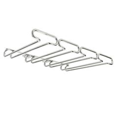 four metal clothes hangers on a white background