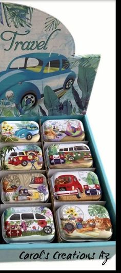 a blue box filled with lots of different types of tins on top of each other