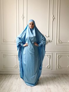 Tender light sky blue silk long khimar with high cuffs. This jilbab will be a good cover for you. Delicate fine silk ideal for summer weather. Always keep in mind that the fabric is enlightened, at the bottom have to be the dress. An elegant way for the believing women. Buttons secure the cuffs. Be sure when ordering in the note write the length of the khimar and the girth of the wrist.We can sew khimar in any other color! This handy headdress like those who do not yet know how to wind a scarf, Hijab Engagement, Wedding Abaya, Sports Hijab, Bohemian Headband, Muslim Dresses, Niqab Fashion, Dubai Abaya, Instant Hijab, Beautiful Prayers