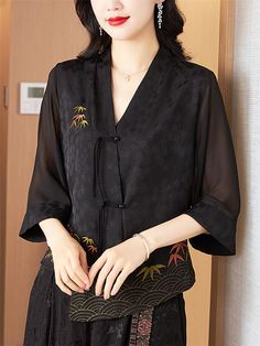 Description Product ID: TP2051644 Shell Material: Polyester Pattern: Embroidery Closure: Knot Button Sleeve: 3/4 Sleeve Season: Summer Style: Fashion, Elegant, Chinese Occasion: Daily, Travel, Shopping Package included 1 * Shirt Size Chart (Asian Size): Please allow 1-3 cm measured error. Size Length Chest Sleeve Length L 60cm | 23.6 in 100cm | 39.4 in 42cm | 16.5 in XL 60.5cm | 23.8 in 104cm | 40.9 in 42.5cm | 16.7 in XXL 61cm | 24.0 in 108cm | 42.5 in 43cm | 16.9 in 3XL 61.5cm | 24.2 in 112cm | 44.1 in 43.5cm | 17.1 in 4XL 62cm | 24.4 in 116cm | 45.7 in 44cm | 17.3 in Black Half Sleeve Shirt For Fall, Black Button-up Blouse With Floral Embroidery, Black Floral Embroidery Button-up Blouse, Black Shirt With Floral Embroidery For Fall, Spring Black Embroidered Shirt, Black Floral Embroidery Button-up Shirt, Traditional Black Tops With Buttons, Black Embroidered Shirt For Spring, Black Button-up Shirt With Floral Embroidery