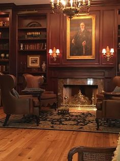 a living room filled with furniture and a fire place