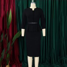 This dress is made from a lightweight polyester material, perfect for all seasons. Its regular fit and slight stretch provide comfort and the V-neck neckline and empire waistline create a polished, office lady style. The three quarter sleeves are adorned with sashes, and the dress falls to a mid-calf length, creating a flattering sheath silhouette. Designed in Mainland China, this dress is suitable for middle-aged women and is available in a solid color pattern with a pullover closure. Its fabric composition is primarily natural fiber with a hint of polyester, making it a durable and stylish choice. Solid Color Office Lady Midi Dress, Tailored Black Dress For Office Wear, Solid Color Midi Dress For Office Wear, V-neck Office Lady Dress For Business Casual, Solid Office Lady Dresses For Office Wear, Office Lady Solid Color Dresses For Work, Office Lady V-neck Midi Dress For Workwear, Office Lady Black Midi Dress For Work, Career V-neck Dresses For Fall