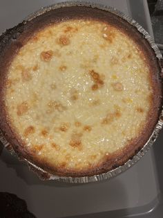 a pie sitting on top of a metal pan