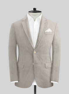 If you want a suit that's very much of the time, our Ivy Beige Linen Suit should be your first port of call. Crafted from linen in 40s Lea, the suit is light in weight and naturally regulates heat, absorbing moisture, which in turn transfers heat away from the body. Linen is a strong fabric that is finally having its day in the sun, and even at the office, our ivy beige suit is the one summer fabric to rule them all.  Look Includes   Ivy Beige Linen Fabric  Two Button Jacket Style  Notch Lapel Beige Linen Suit, Peaky Blinders Suit, White Linen Suit, Herringbone Tweed Jacket, Green Velvet Jacket, Royal Blue Suit, Beige Suits, Beige Jacket, Beautiful Suit