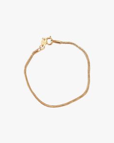 Product Description The slinkiest and daintiest bracelet that you can wear every day for that barely-there look. Featuring a 2mm width 18k gold-filled snake chain that can easily be stacked. Tarnish-resistant, showerproof, and safe for sensitive skin. …………………………………. D E T A I L S Snake chain width measures 2 mm Snake chain length measures 6.5"/16.5cm Clasp type: spring Tarnish-resistant, waterproof, and safe for sensitive skin Lead-free, nickel-free, cadmium-free Material: 18K Gold Fill Minimalist Snake Chain Bracelet With Lobster Clasp, Tarnish Resistant Snake Chain Bracelet, Adjustable Dainty Snake Chain Bracelet, Dainty Adjustable Snake Chain Bracelet, Everyday Adjustable Snake Chain Bracelet, Adjustable Snake Chain Bracelet, Gold Snake Chain Bracelet With Adjustable Chain, Dainty Snake Chain Bracelet With Adjustable Chain, Yellow Gold Snake Chain Bracelet