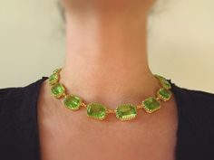 "I am such a sucker for Peridot! Bright and lively, unusual and striking- it is such a wonderful color. Made even more wonderful because these are vintage Swarovski crystals. They are heavily faceted and so sparkly. The closest thing to real gems that you can find! I put these lovely stones into my favorite settings, custom made for me, with elaborate crown prongs and offset loops to prevent them from flipping. They are open-backed settings, which is a great way to present these beautiful stones Regency Jewelry, Collar Verde, Green Crystal Necklace, Riviere Necklace, Peridot Crystal, Antique Jewellery Designs, Historical Jewellery, Swarovski Crystal Necklace, Sparkle Jewelry