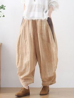 Style: Casual Material: Linen Pattern: Solid Color Length: Full Length Closure Type: Elastic Silhouette: Harem Gender: Female Season: Summer #pants #linen #trousers #summer Beige Cotton Harem Pants For Fall, Fall Beige Cotton Harem Pants, Baggy Brown Ankle Pants, Beige Relaxed Fit Harem Pants For Fall, Baggy Brown Harem Pants With Pockets, Brown Relaxed Fit Ankle-length Harem Pants, Khaki Tapered Leg Harem Pants For Summer, Brown Ankle-length Relaxed Fit Harem Pants, Brown Spring Parachute Pants With Side Pockets